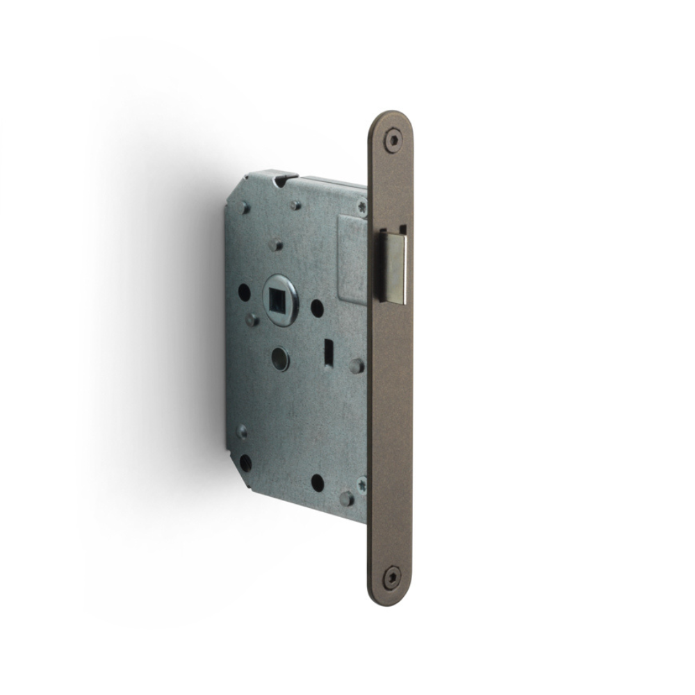 Formani BASICS LBLA-SFC en FMB Woningbouw loopslot afgerond Brons en PVD Licht Brons — insteekslot zonder vergrendeling voor doorloop-binnendeur in warm rood-bruin, voor landelijke woning en klassieke renovatie met warme metaal-accent.
