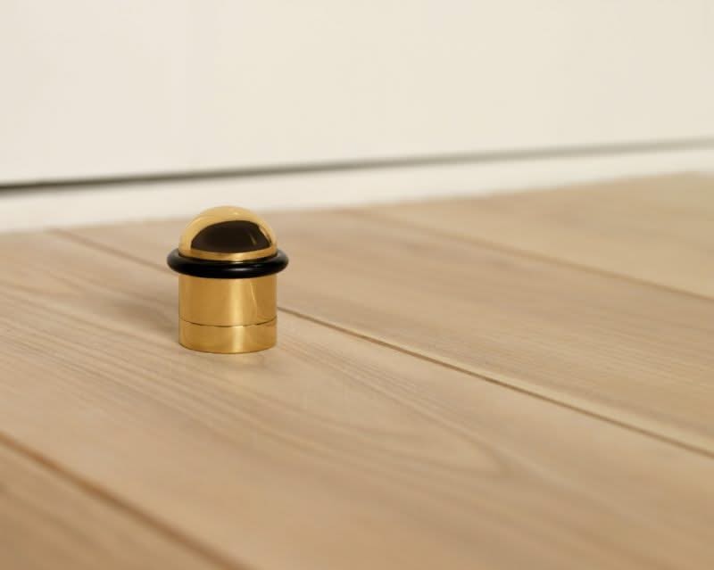 Intersteel deurstop met ring messing gelakt – detail stootring